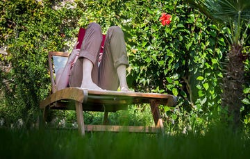 woman relaxing on lawn
