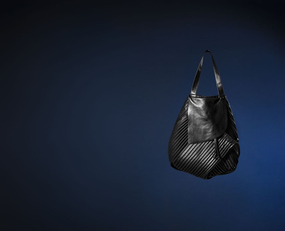 Bag, Hobo bag, Handbag, Blue, Fashion accessory, Still life photography, Silver, Sky, Design, Material property, 