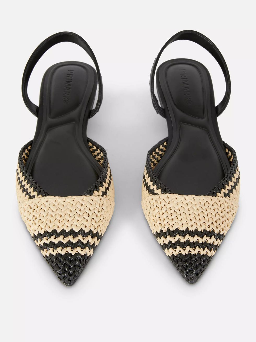 a pair of black and gold purses