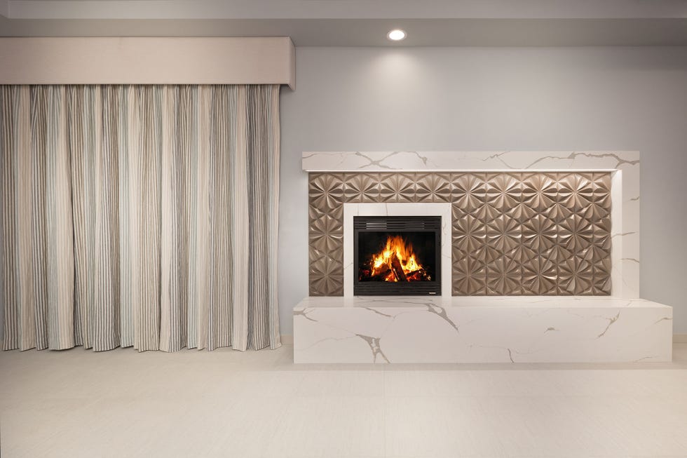 15 Stylish Tiled Fireplaces - Modern Fireplace Tile Surround Ideas