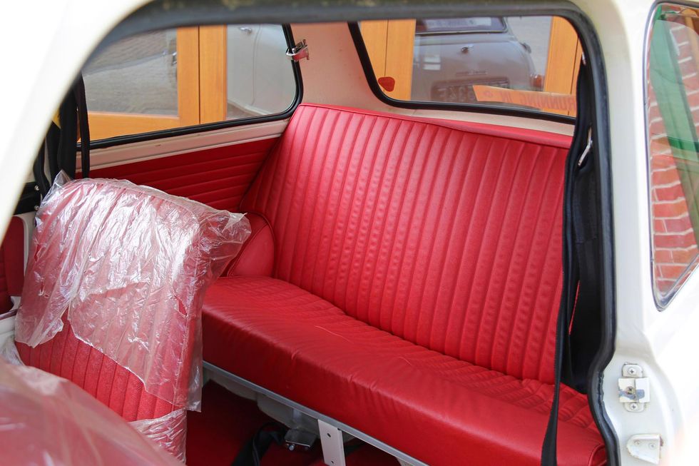 Motor vehicle, Mode of transport, Vehicle, Transport, Vehicle door, Red, Car seat, Classic car, Classic, Car seat cover, 