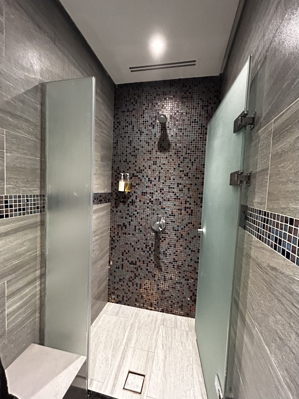 a shower with a glass door