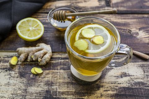 a cup of lemon ginger tea with honey