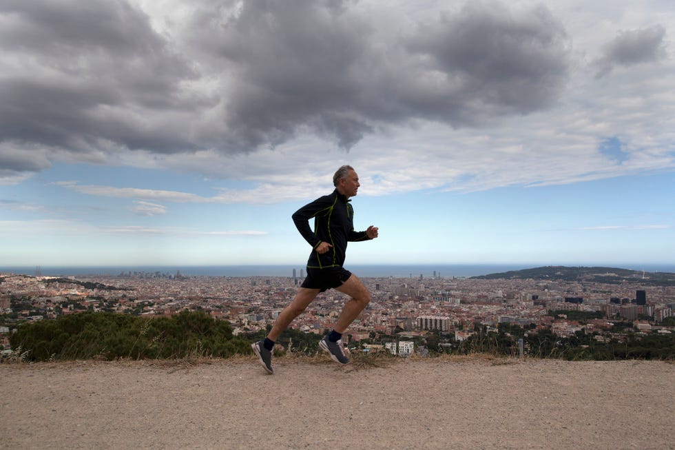 a male running in the city