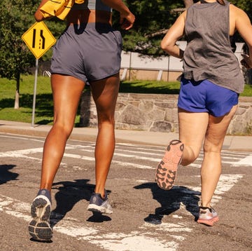 Group of runners crossing a street group of runners crossing a street