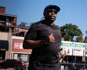 a man running on a street