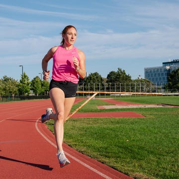 woman running on a track woman running on a track
