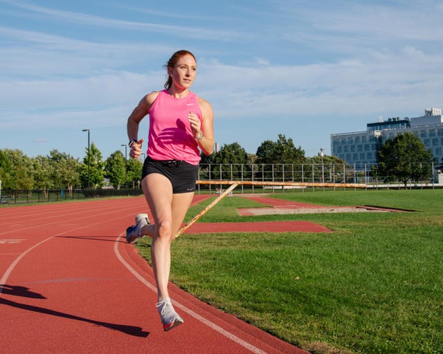 woman running on a track