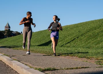 two women running