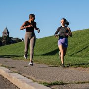 two women running