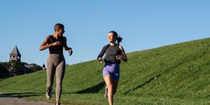 two women running