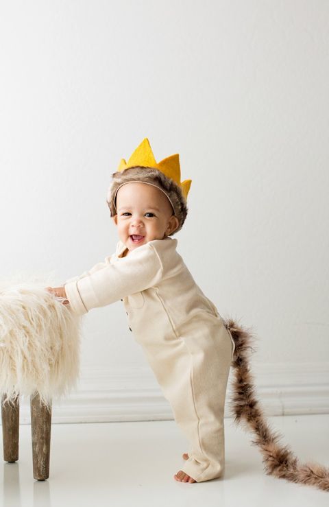 toddler dressed as max from where the wild things are with furry tail and yellow crown