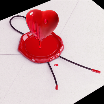 a letter sealed with a waxy red heart