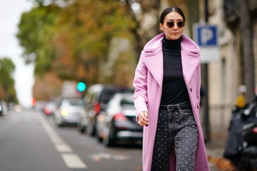 a woman wearing embellished jeans