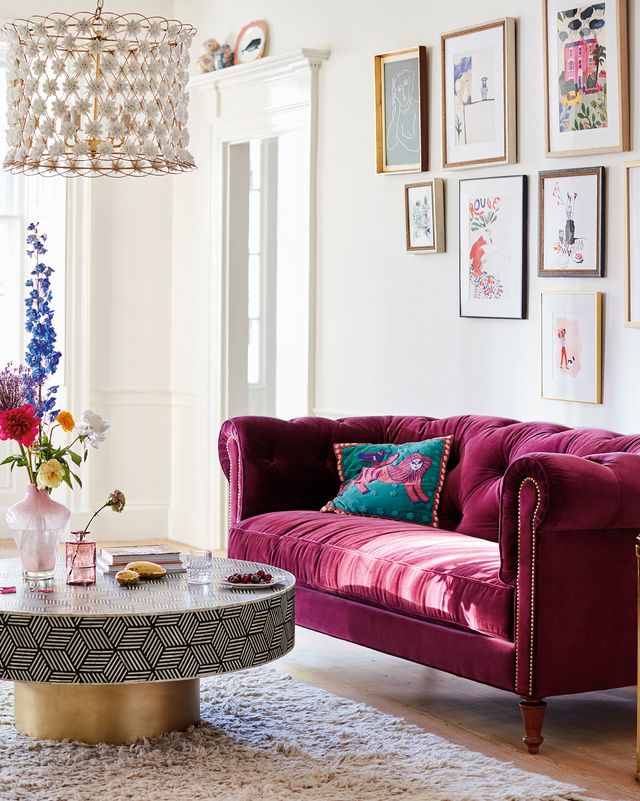 plush living room with pink sofa