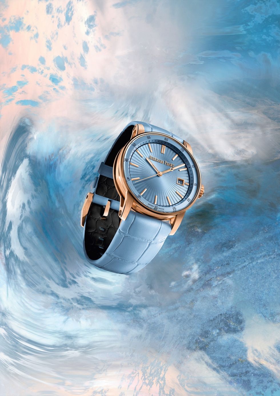 愛彼ap以玫瑰金錶殼搭配淺藍色錶面和錶帶的全新code 1159系列38毫米自動上鏈腕錶。