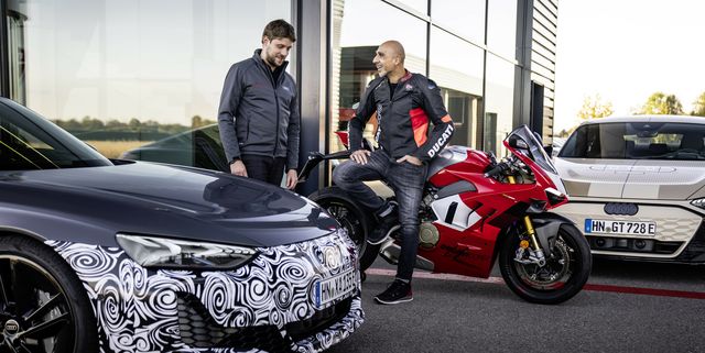 controllable performance in a double pack jaan mattes reiling left, technical project manager at audi in neckarsulm, and ducati chief tester alessandro valia after a ride in the prototype of the upgraded e tron gt and the ducati panigale v4 r