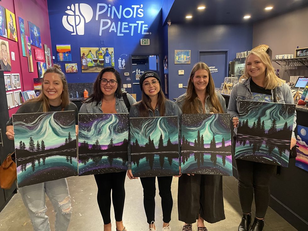 brittany grose and her friends at a paint and sip night