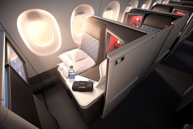 What It's Like to Fly in Delta's New Business-Class Delta One Suites ...