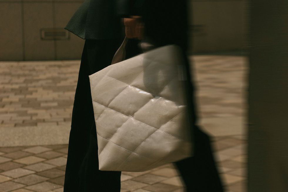 a person carrying a bag