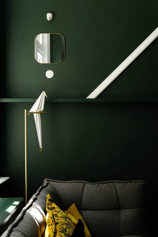 Green, Lighting, Light, Light fixture, Room, Lamp, Wall, Yellow, Furniture, Lighting accessory, 