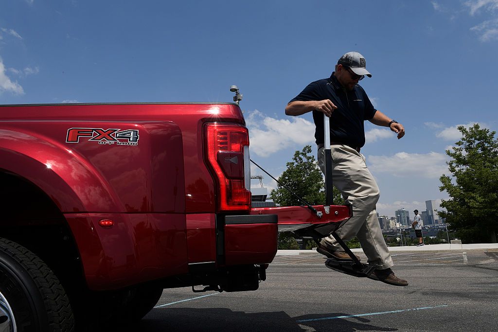 Truck bed outlet step