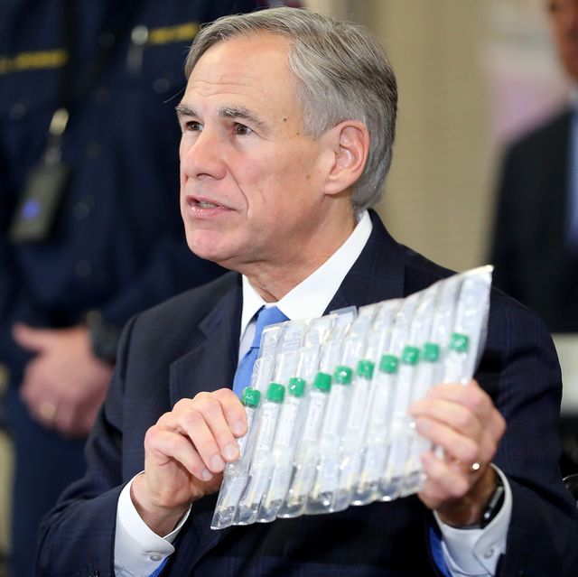 arlington, texas   march 18 texas governor greg abbott displays covid 19 test collection vials as he addresses the media during a press conference held at arlington emergency management on march 18, 2020 in arlington, texas abbott announced that arlington health officials received 2,500 testing kits so all residents and workers at the texas masonic retirement home, the retirement home where covid 19 victim patrick james lived with his wife, will be tested for the virus photo by tom penningtongetty images