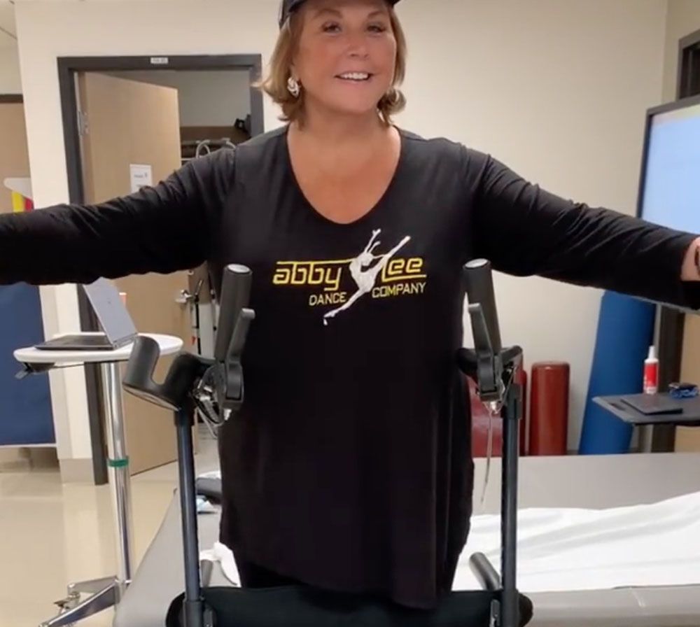 Why is Abby Lee Miller using a wheelchair?