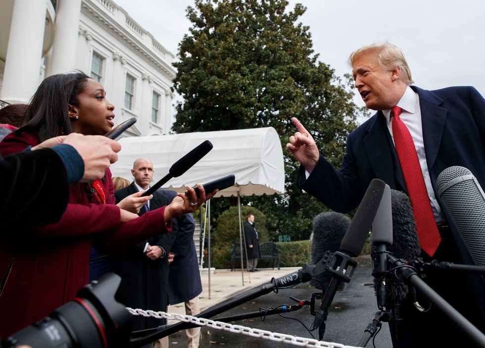mandatory credit photo by evan vucciapshutterstock 9972318w
donald trump, abby phillip cnn journalist abby phillip asks president donald trump a question as he speaks with reporters before departing for france on the south lawn of the white house, in washington
trump, washington, usa   09 nov 2018