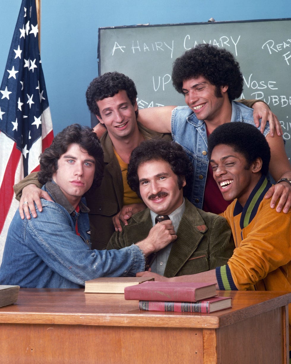 JOHN TRAVOLTA;RON PALILLO;GABE KAPLAN;ROBERT HEGYES;LAWRENCE HILTON-JACOBS welcome back, kotter gallery shoot date july 1, 1975 photo by abc photo archivesdisney general entertainment content via getty images john travoltaron palillogabe kaplanrobert hegyeslawrence hilton jacobs