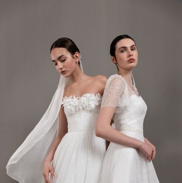 two women in white dresses