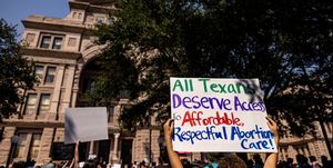 a protest sign that reads all texans deserve access to affordable, respectful abortion care