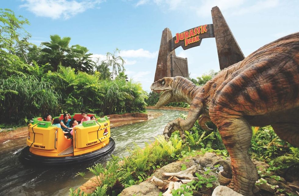 Dinosaur, Amusement park, Water, Tree, Bank, Photography, Recreation, Park, Leisure, Vehicle, 