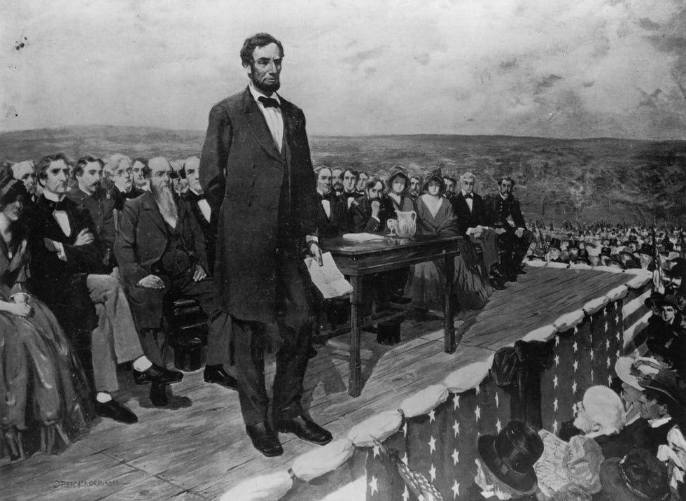 a painting of the gettysburg address with abraham lincoln standing on a stage and talking to a crowd