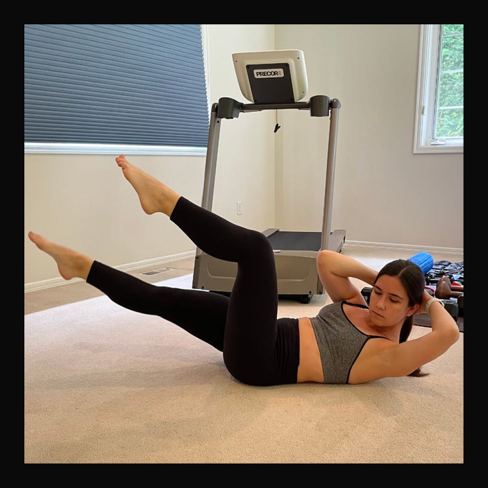 a person performing an exercise routine on the floor