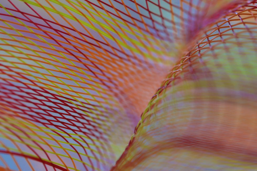 abstract image of a multi colored mesh ribbon in autumn colors
