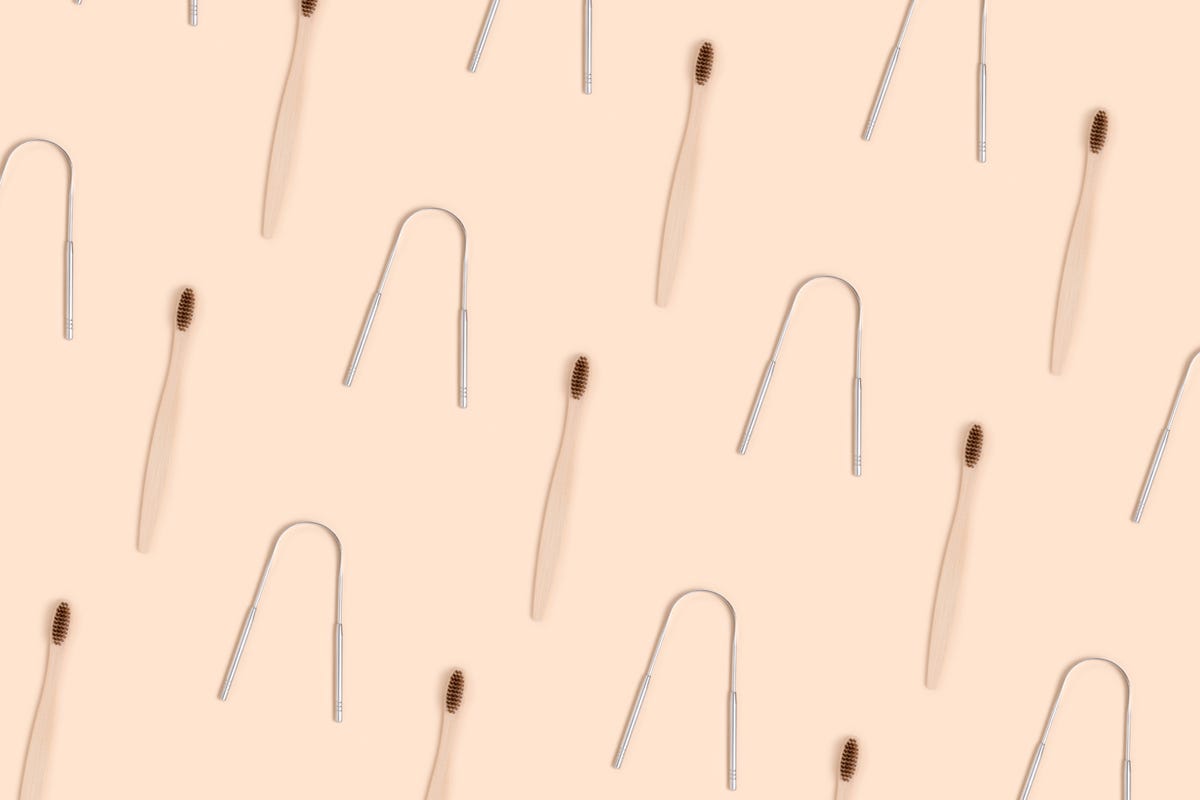 accessories for tooth hygiene pattern on a beige background