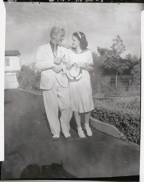 Judy Garland and Jackie Cooper Walking Arm in Arm