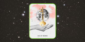 the ace of wands tarot card, showing a hand holding up a golden key over a full moon