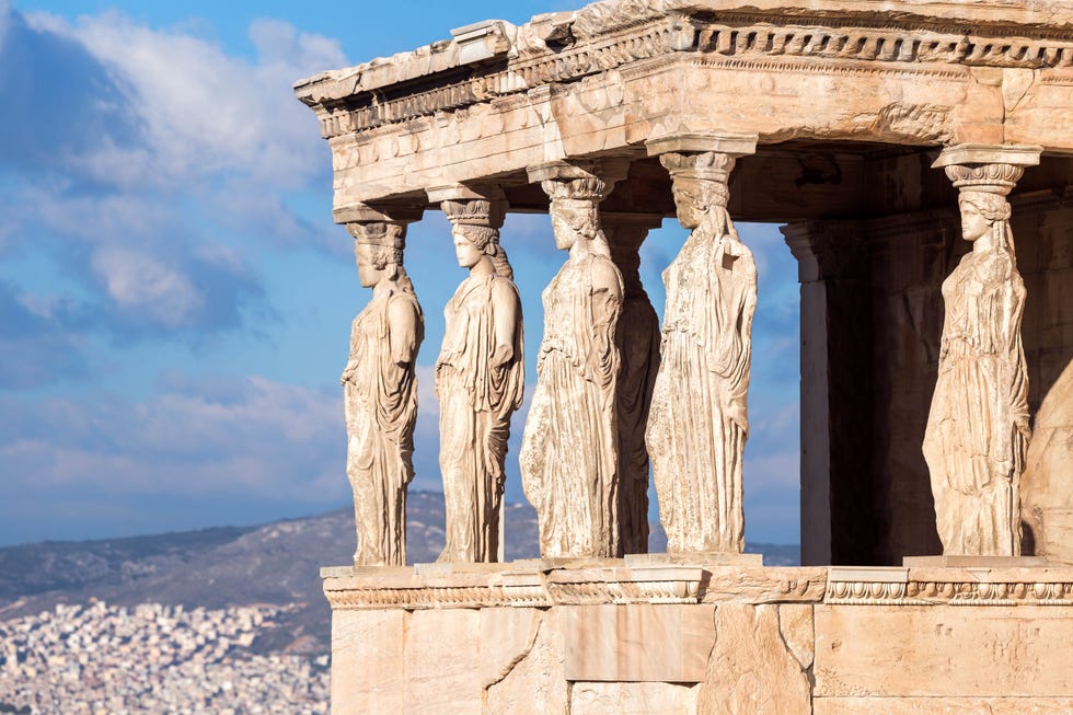 the erechtheion erechtheum, temple of athena near the pantheon at the acropolis, athens, greecethe temple honors athena and poseidon, featuring a porch with 6 caryatids