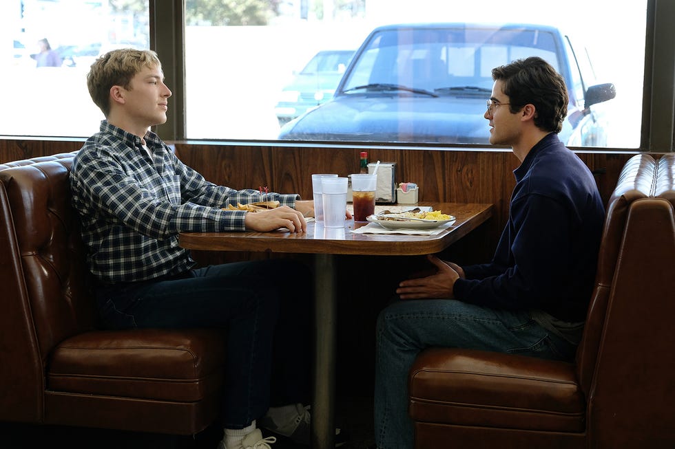 Conversation, Interaction, Sitting, Table, Furniture, Vacation, Room, Restaurant, Interior design, Vehicle, 
