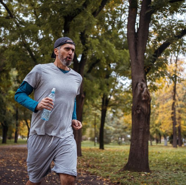 active mature man is jogging
