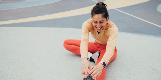 https://hips.hearstapps.com/hmg-prod/images/active-woman-stretching-on-outdoor-court-showing-royalty-free-image-1741725165.pjpeg?crop=1xw:0.74965xh;center,top&resize=640:*