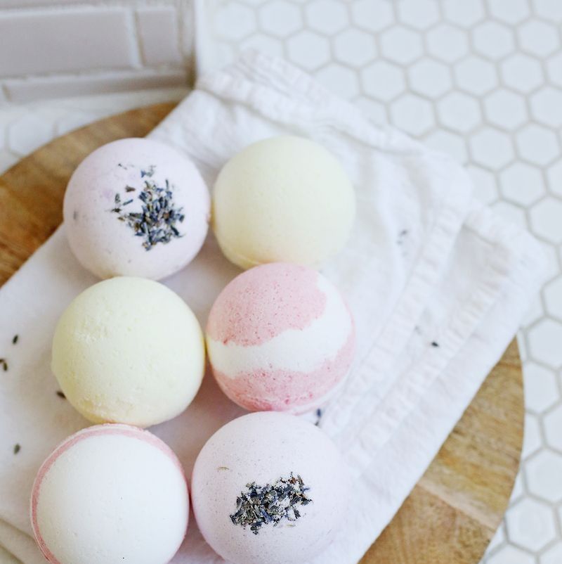 A set of six bath bombs hangs in the bathroom. This project is perfect for housekeeping as a great activity for kids.