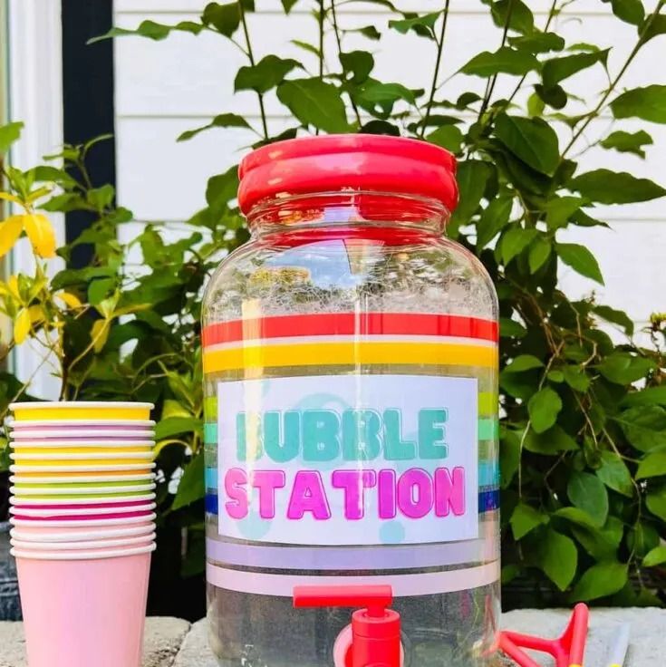 a bubble station sits on a rock wall the project is a good housekeeping pick for best activities for kids