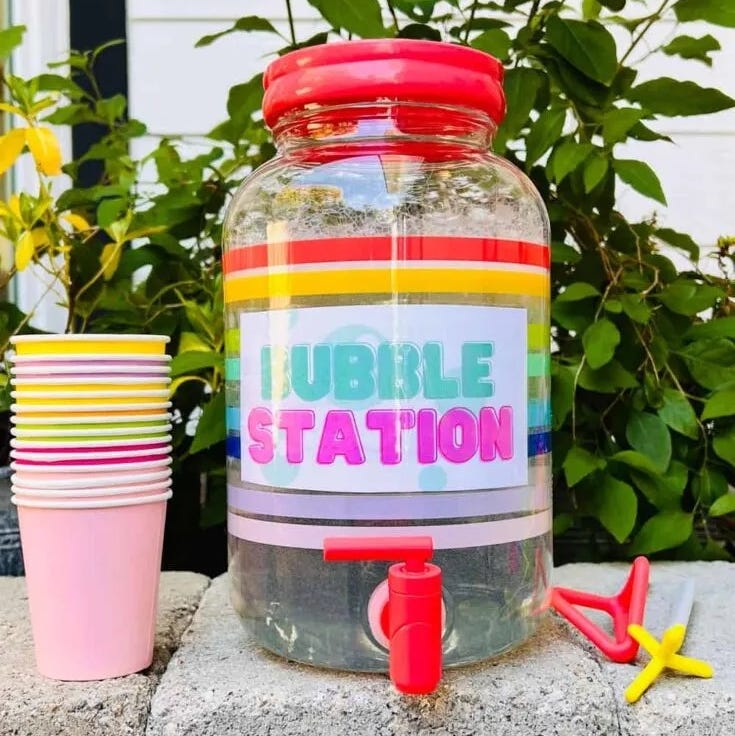 a bubble station sits on a rock wall the project is a good housekeeping pick for best activities for kids