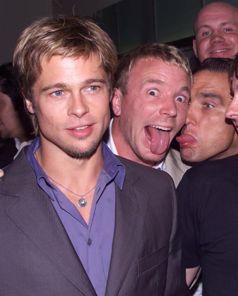 brad pitt with guy richie and vinnie jones at the uk premiere of snatch in londons odeon cinema on august 23rd 2000