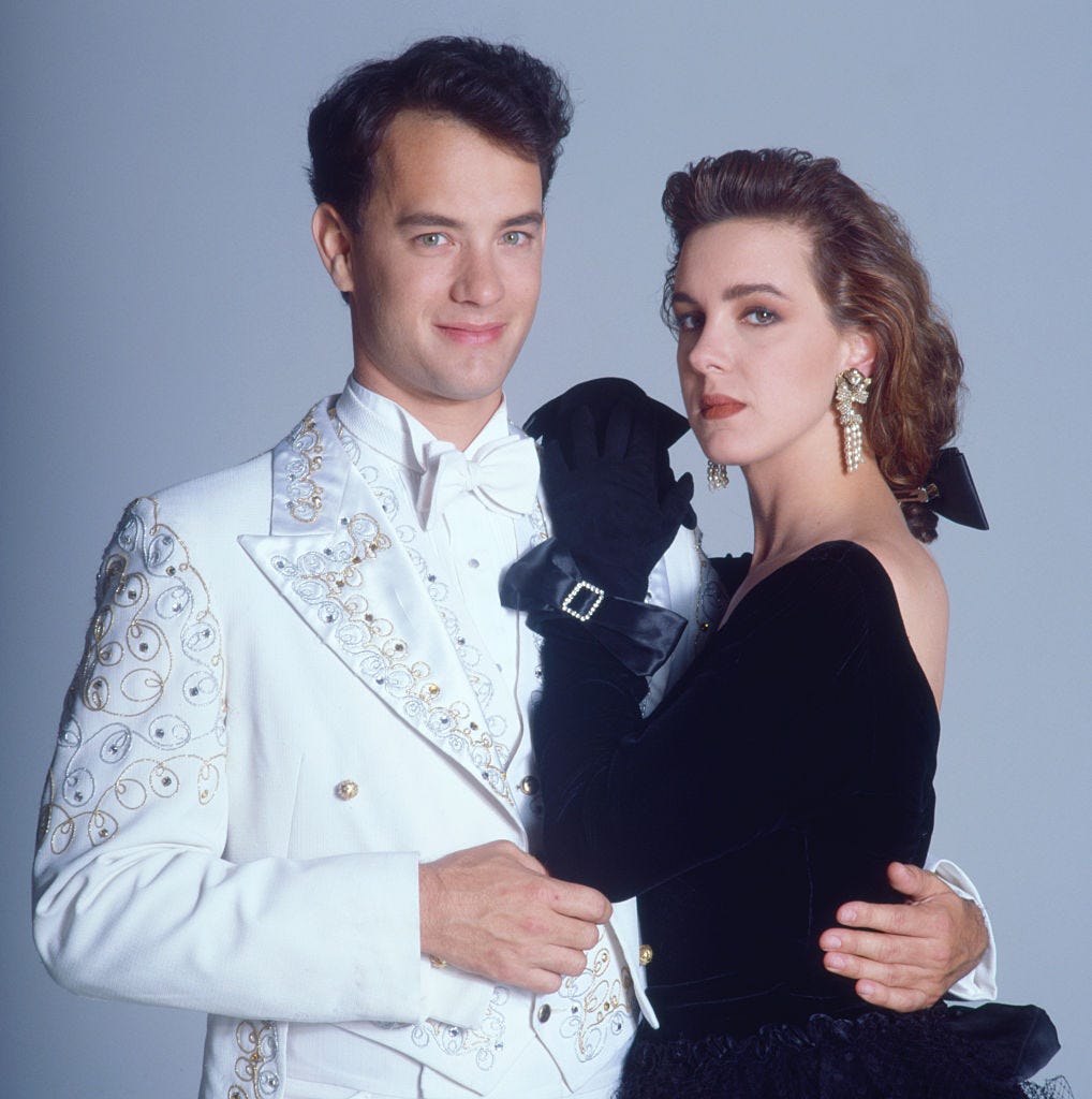 tom hanks and elizabeth perkins pose for a photo while in character for big