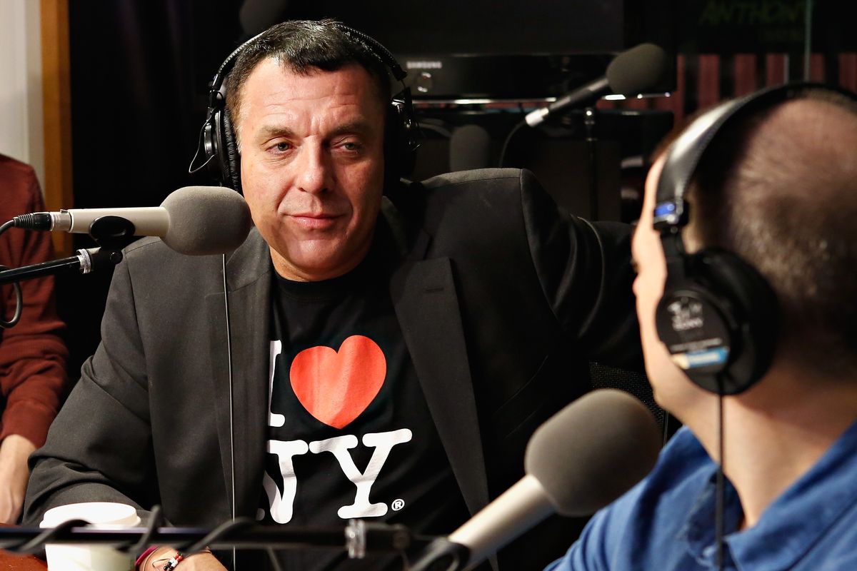 tom sizemore sitting at microphone in radio studio talking to interviewer