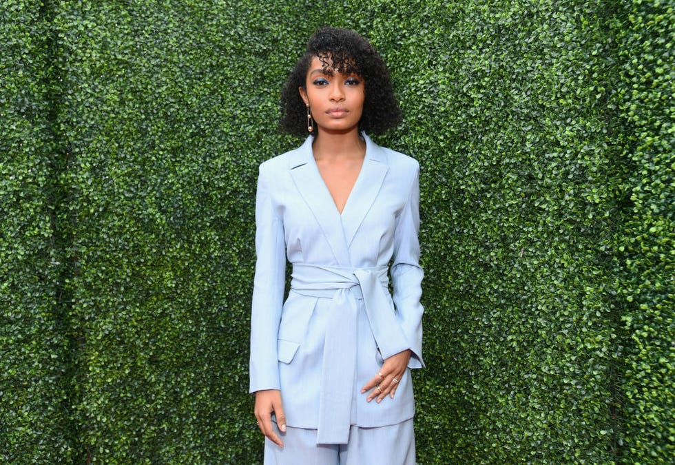 yara shadidhi's short black hairstyle is a natural wash and go with curly bangs